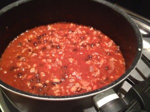 Chili simmering to blend seasonings