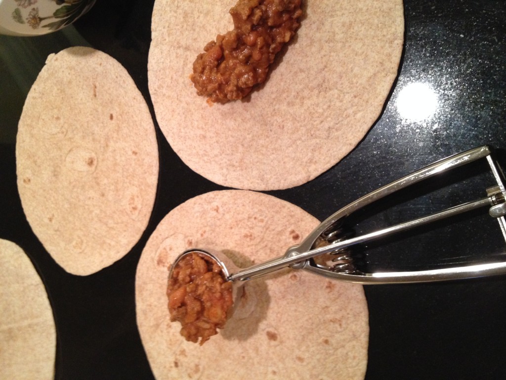 Tidbit Tip:  Use this handy scoop to put the meat mixture on the tortillas.  