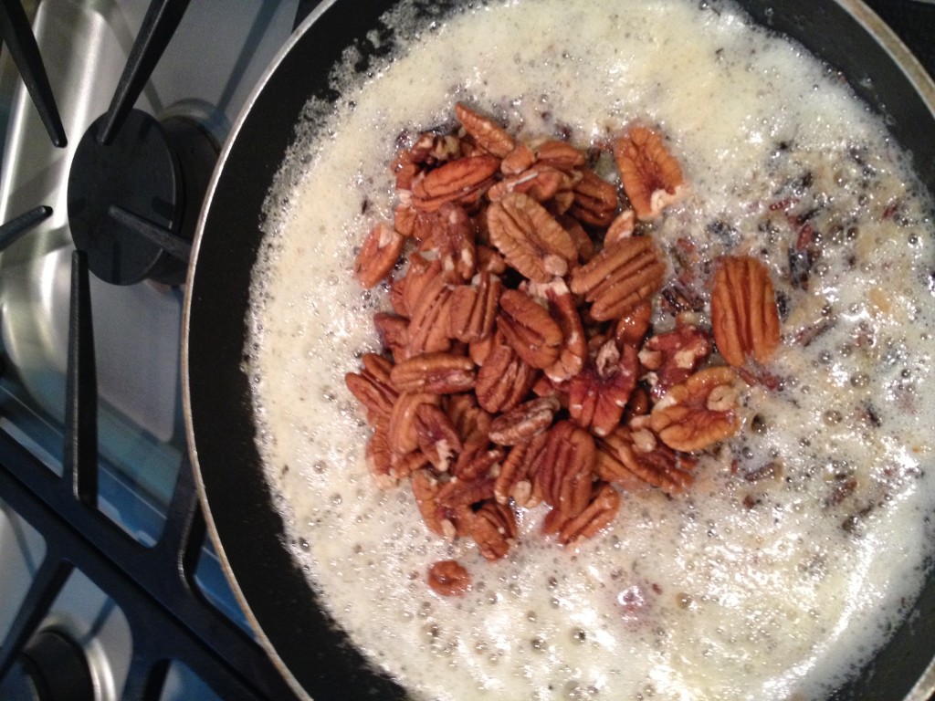 After rice is browned add pecans for browing
